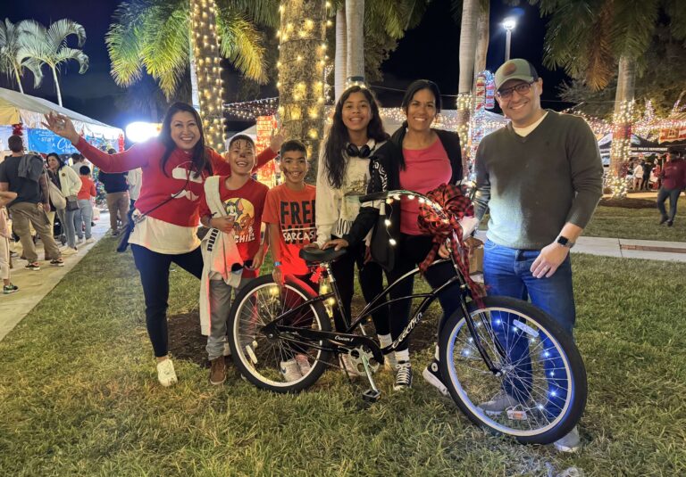 Hernandez Family Wins Free Bike at Holiday Tree Lighting Event!